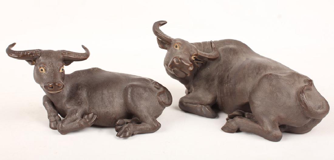 2 CHINESE CERAMIC RECUMBENT BULL FIGURINES (1 of 7)