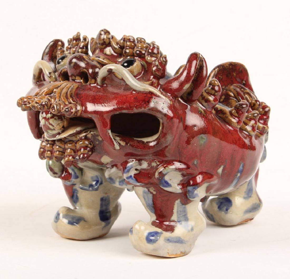 STONEWARE THREE LEGGED FOO DOG INCENSE BURNER: STONEWARE THREE LEGGED FOO DOG INCENSE BURNER Stoneware three legged foo dog incense burner. Size: 9.5 x 6.5 x 7" Shipping / Pickup: Buyer Pick Up, 3rd Party