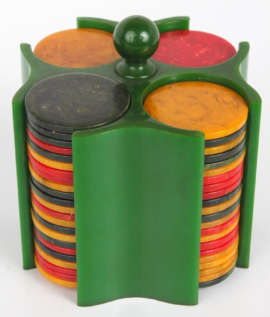 BAKELITE GAMING CHIPS: BAKELITE GAMING CHIPS Lot of yellow, red, and green Bakelite poker game chips, accompanied by green Bakelite stand. Shipping / Pickup: Buyer Pick Up, 3rd Party