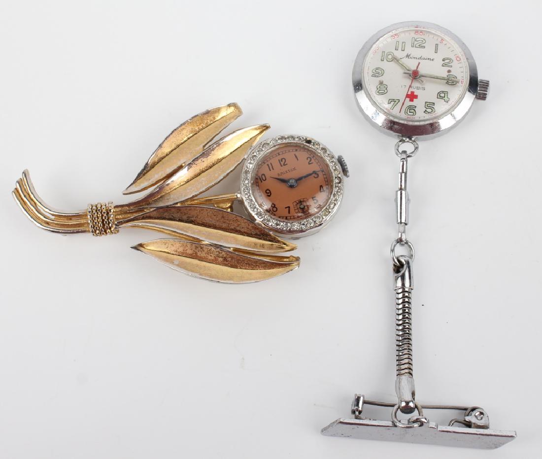 LADIES MID-CENTURY BROOCH WATCHES: LADIES MID-CENTURY BROOCH WATCHES Two ladies mid-century brooch watches, includes: Moondaine 17 jewels with stainless steel case, and Raleigh floral motif with gold plated stainless steel case. Shippi