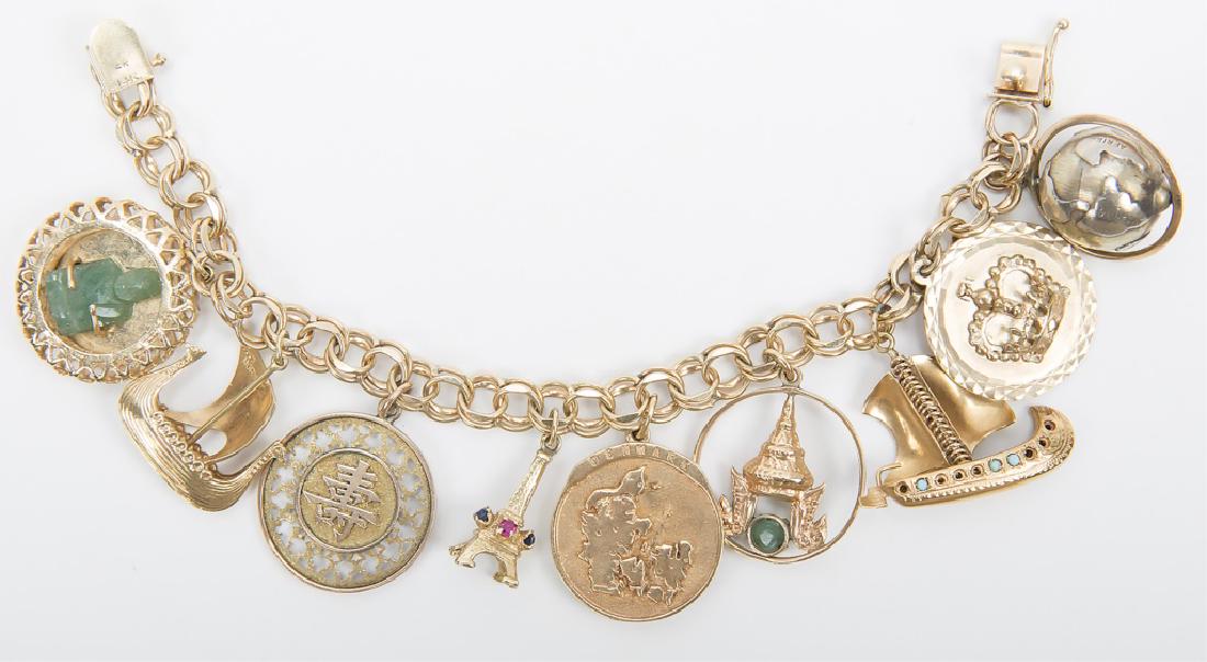 LADIES YELLOW GOLD BRACELET W/9 CHARMS (1 of 4)