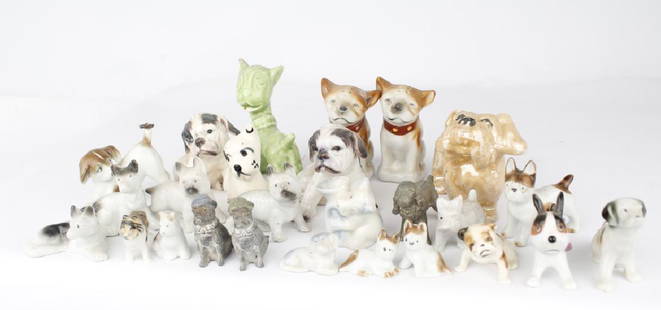 DOG/ PUPPY CERAMIC FIGURINE LOT OF 26: DOG/ PUPPY CERAMIC FIGURINE LOT OF 26 Ceramic dog figurines. Includes salt and pepper shaker, antique, vintage and modern dogs. Condition varies throughout. Shipping / Pickup: We Can Ship This Item Co