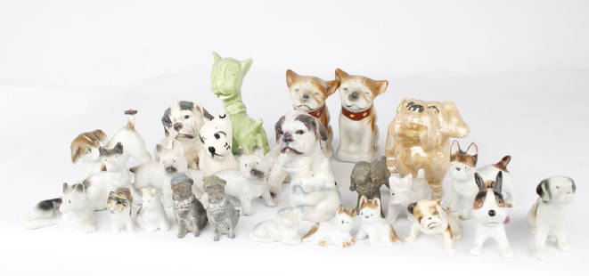 DOG/ PUPPY CERAMIC FIGURINE LOT OF 26: DOG/ PUPPY CERAMIC FIGURINE LOT OF 26 Ceramic dog figurines. Includes salt and pepper shaker, antique, vintage and modern dogs. Condition varies throughout. Shipping / Pickup: We Can Ship This Item Co