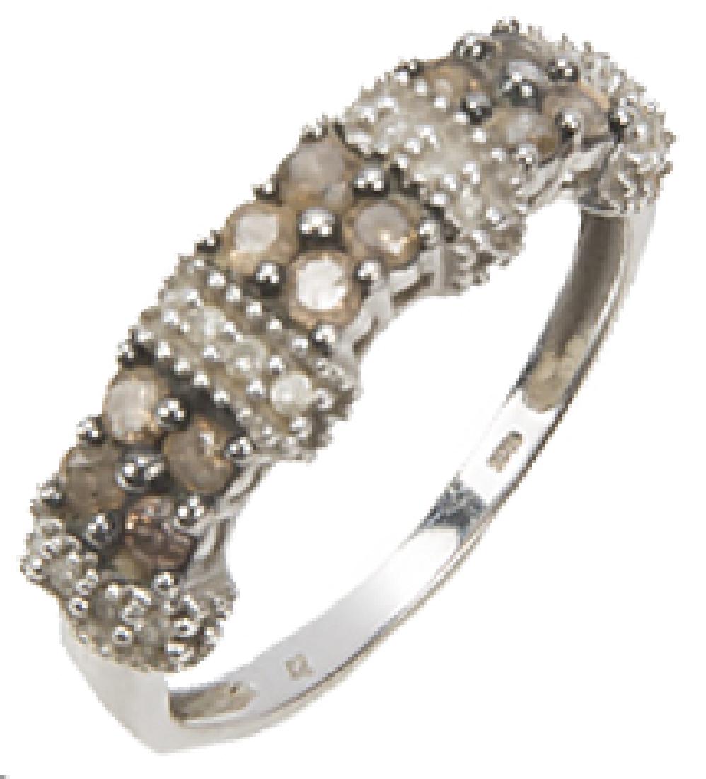 10K WHITE GOLD CHOCOLATE DIAMOND BAND RING: 10K WHITE GOLD CHOCOLATE DIAMOND BAND RING 10k white gold Chocolate diamond band. (12) 0.02 ct Chocolate diamonds and (16) 0.01ct accent diamonds. Weight: 2.3 g Size: 6