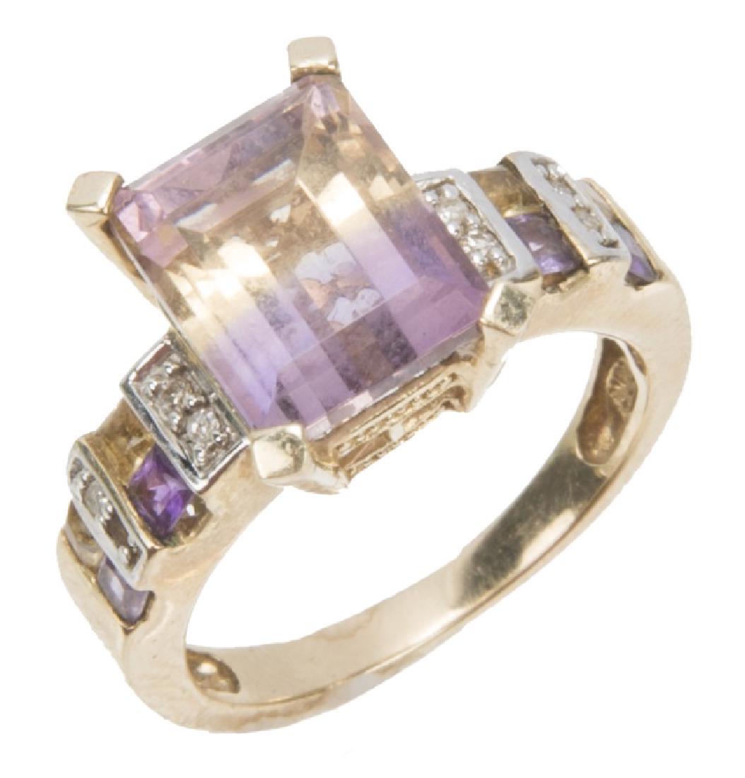 10K YELLOW GOLD AMETRINE FASHION RING: 10K YELLOW GOLD AMETRINE FASHION RING 10k yellow gold Ametrine ring. 10mm x 8mm emerald cut Ametrine center stone with diamond and gemstone accents. Weight: 4.7 g Size: 6