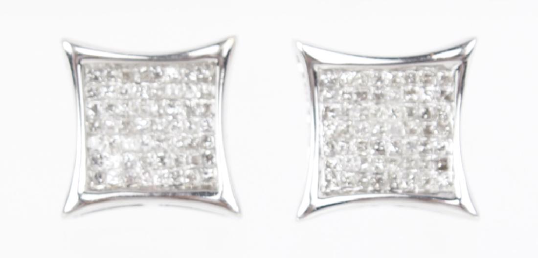 LADEIS 14K WHITE GOLD DIAMOND STUD EARRINGS: LADEIS 14K WHITE GOLD DIAMOND STUD EARRINGS Ladies 14k white gold stud earrings with Micro Pave square cluster of white diamonds with .56ctw. Weight: 2.69 g Size: 14mm x 14mm
