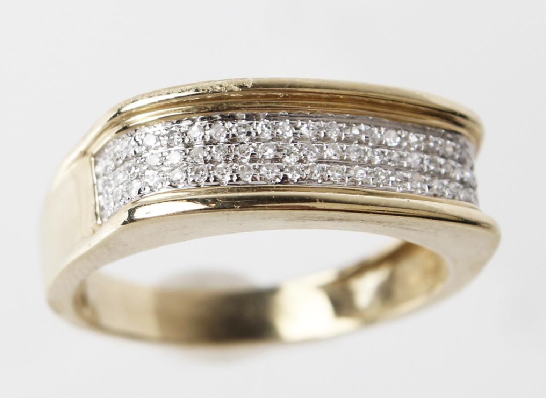 10K YELLOW GOLD DIAMOND BAND RING: 10K YELLOW GOLD DIAMOND BAND RING 10k yellow gold diamond ring with (63) Micro pave set round white diamonds. .50CTW. Weight: 3.53 g Size: 8