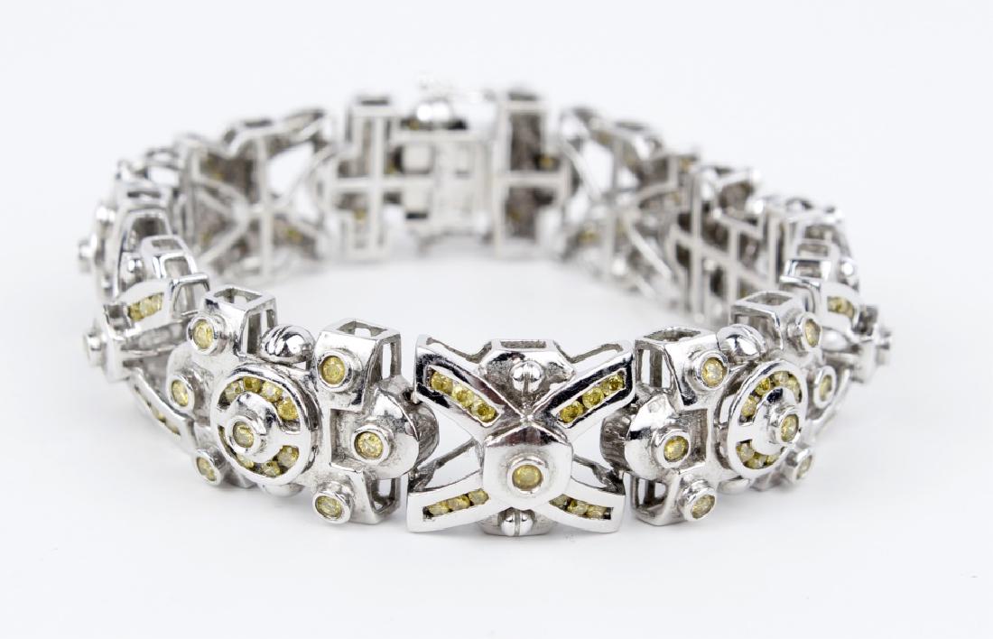 MENS 14K WHITE GOLD YELLOW DIAMOND BRACELET: MENS 14K WHITE GOLD YELLOW DIAMOND BRACELET Men's 14k white gold bracelet with yellow diamonds. (139) yellow diamonds, 0.03ct each for a total of 4.17CT. Weight: 55.7g Size: 8"