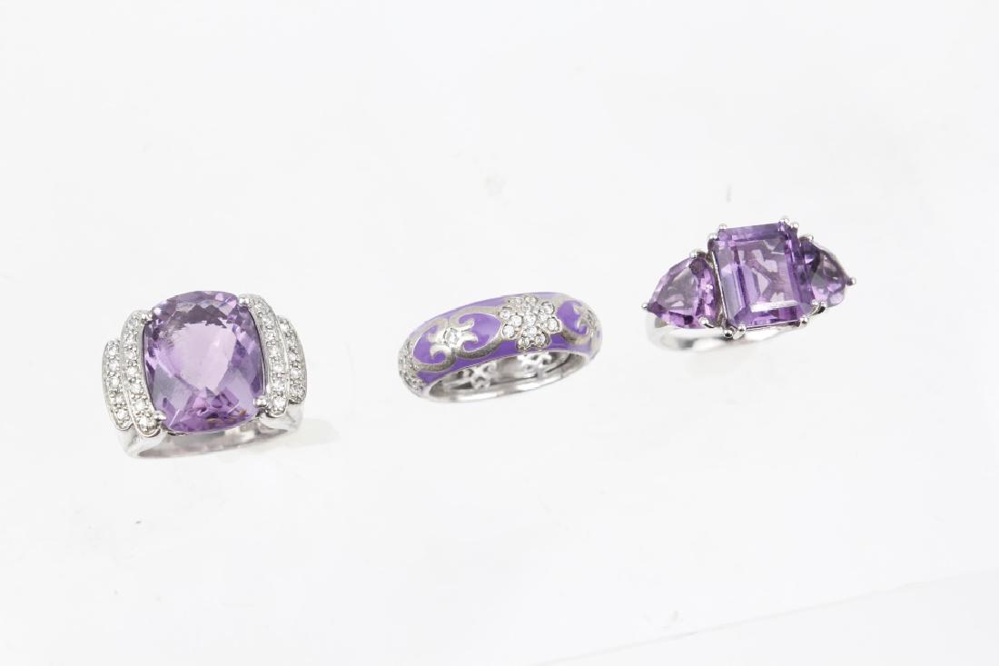 .925 STERLING SILVER AND AMETHYST RINGS - LOT OF 3: .925 STERLING SILVER AND AMETHYST RINGS - LOT OF 3 Lot of three .925 sterling silver and amethyst rings. (1) sterling with CZ and enamel accents, (2) Amethyst. Weight: 19.0 g