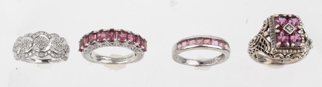 STERLING SILVER FASHION RINGS - LOT OF 4: STERLING SILVER FASHION RINGS - LOT OF 4 Lot of four sterling silver fashion rings with pink topaz and diamond accents. Weight: 16.7 G
