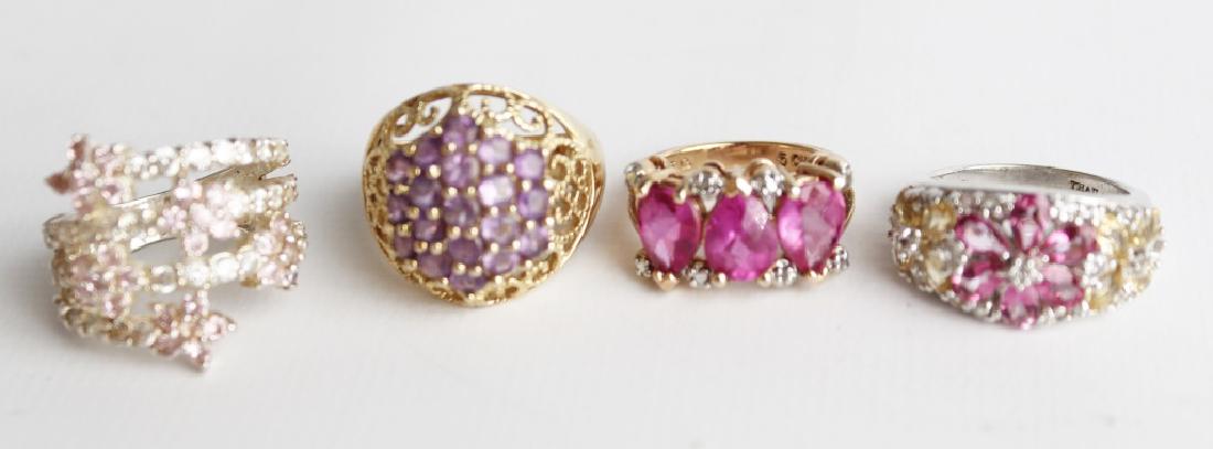 .925 STERLING SILVER GEMSTONE RINGS - LOT OF 4: .925 STERLING SILVER GEMSTONE RINGS - LOT OF 4 Lot of four .925 Sterling Silver gemstone rings. To include amethyst, pink topaz and white topaz. Weight: 21.9 g Size: 6