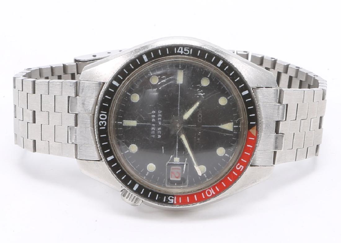 MEN`S ACCUTRON DEAP 666 FEET SEA DIVER WATCH: MEN`S ACCUTRON DEAP 666 FEET SEA DIVER WATCH Men's steel Bulova Accutron diver wristwatch to date c.1969, signed Bulova bracelet. Bi-directional Coke black and red bezel, water resistant to 666 feet.