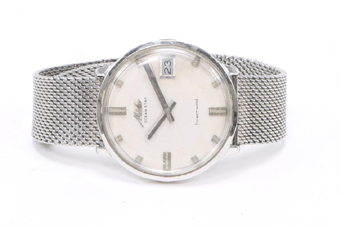 MEN`S STEEL MIDO OCEAN STAR POWERWIND WATCH: MEN`S STEEL MIDO OCEAN STAR POWERWIND WATCH Men's steel Swiss Mido OceanStar calendar wristwatch, 1960s model. Automatic Powerwind movement. Weight: 58.4 grams Size: 36mm