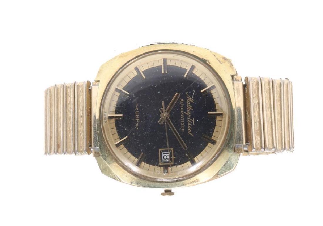 MEN`S GOLD TONE MATHEY TISSOT UHF AUTOMATIC WATCH: MEN`S GOLD TONE MATHEY TISSOT UHF AUTOMATIC WATCH Men's gold plated Mathey-Tissot Automatique UHF calendar wristwatch on gold plated Speidel stretch band. Weight: 73.2 grams Size: 36mm