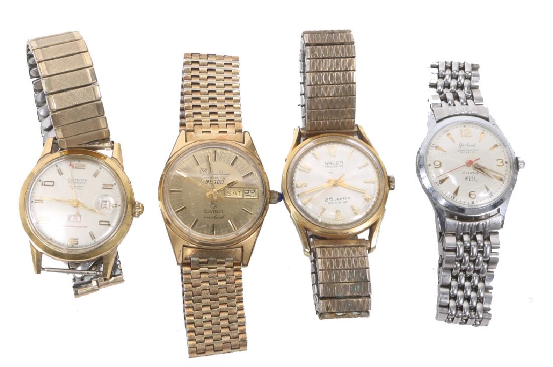 20TH CENTURY MEN`S WRISTWATCHES - LOT OF 4: 20TH CENTURY MEN`S WRISTWATCHES - LOT OF 4 Lot of four men's gold plated and steel wrist watches, including: Gruen precision, Garland PA 21 Jewel, Clinton day date, and Lucien Piccard Da Vinci. Weight