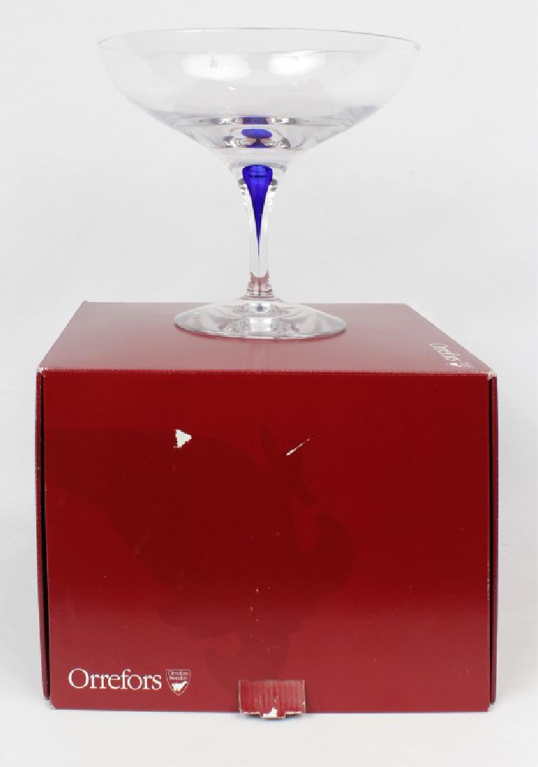 ORREFORS SWEDEN CRYSTAL COMPOTE DISH: ORREFORS SWEDEN CRYSTAL COMPOTE DISH Orrefors Sweden Crystal Intermezzo compote dish with blue stem detail. Size: 8"