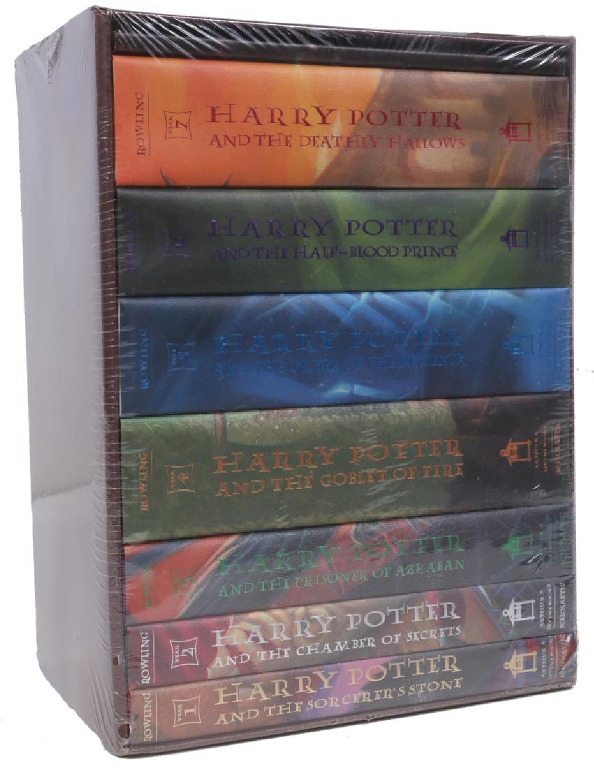 HARRY POTTER COLLECTION VOLUMES 1-7: HARRY POTTER COLLECTION VOLUMES 1-7 Harry Potter collection volumes 1-7 still in the original packaging by JK Rowling. Size: 13 X 10 X 7"