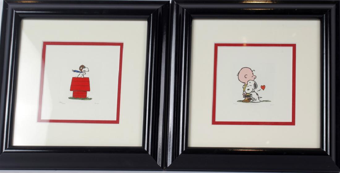 PEANUTS ORIGINAL ANIMATION CELS - LOT OF 2: PEANUTS ORIGINAL ANIMATION CELS - LOT OF 2 Lot of two original animation serigraph cels. (1) snoopy on top of his red dog house, (1) snoopy hugging Charlie Brown. Limited edition of 2500. Size: 11" x 