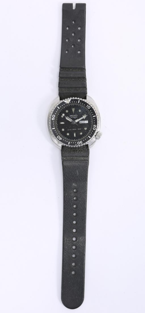 SEIKO TURTLE AUTOMATIC 6309-7049 WRISTWATCH: SEIKO TURTLE AUTOMATIC 6309-7049 WRISTWATCH Men's Seiko automatic day date wristwatch model 6309-7049. Steel case, automatic Japanese movement water resistance of 150m, unidirectional black bezel, lum