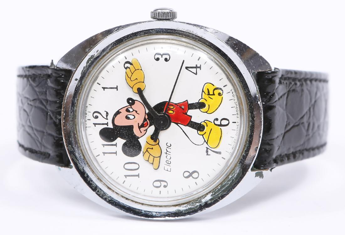 TIMEX ELECTRIC MICKEY MOUSE STEEL WRISTWATCH: TIMEX ELECTRIC MICKEY MOUSE STEEL WRISTWATCH Timex steel cased wrist watch, White dial, Arabic numerals, Disney "Mickey Mouse" hands. Electric movement, 760514071A. Weight: 41.5 grams Size: 36mm