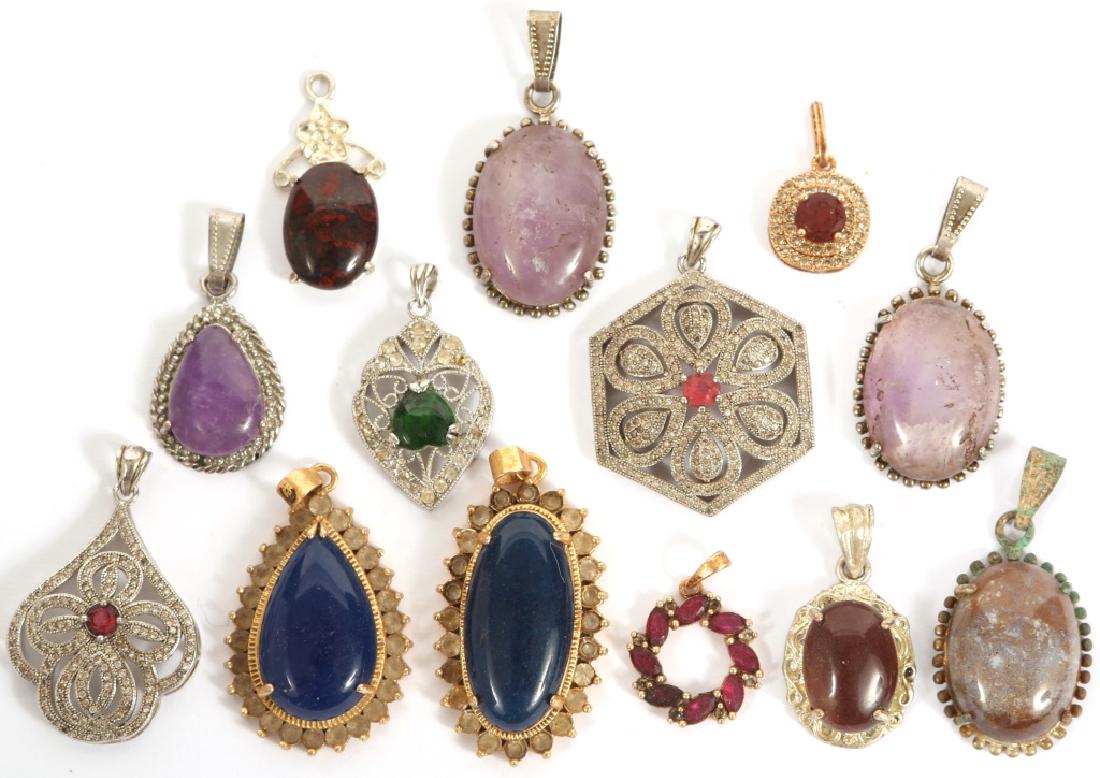 CHINESE INSET STONE PENDANTS -- LOT OF 13: CHINESE INSET STONE PENDANTS -- LOT OF 13 Lot of 13 silver and gold tone pendants with inset colored stones. Weight: 72.2 grams Size: .5 to 1.5"