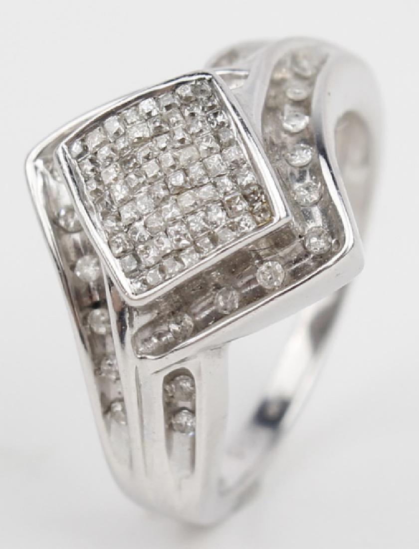 14K WHITE GOLD DIAMOND LADIES FASHION RING: 14K WHITE GOLD DIAMOND LADIES FASHION RING 14k white gold diamond ladies fashion ring. .50 ct micro pave center surrounded by (22) .01ct round accent diamonds. .72cttw. Weight: 5.0 g Size: 7