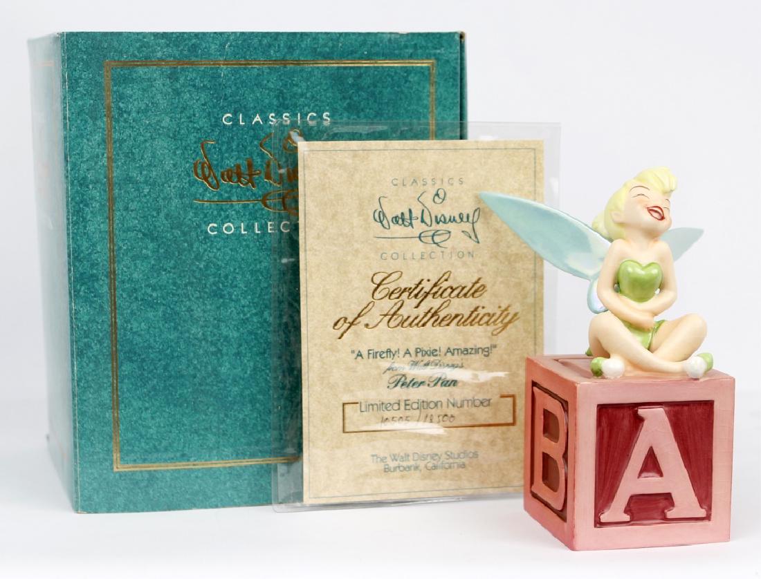 CLASSIC WALT DISNEY COLLECTION - TINKER BELL: CLASSIC WALT DISNEY COLLECTION - TINKER BELL Walt Disney's Classic Collection figurine. From Peter Pan, titled "A Firefly! A Pixie! Amazing!" Tinker Bell on a letter block. Marked with the Treble Clef