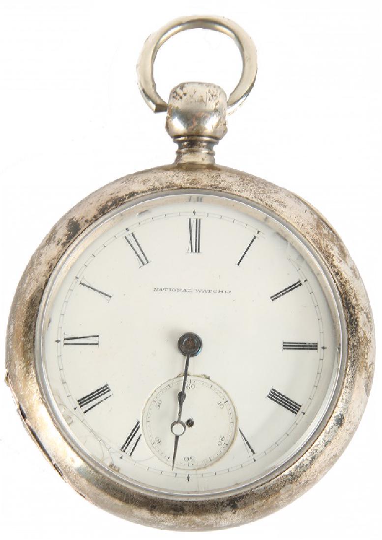 COIN SILVER NATIONAL WATCH CO. POCKET WATCH: COIN SILVER NATIONAL WATCH CO. POCKET WATCH Men's .900 coin silver cased pocket watch, Roman numeral white dial with sub dial at 6:00 position. Weight: 176.6 grams Size: 60mm