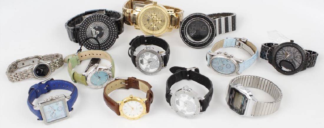 DEALERS LOT OF 12 ASSORTED WATCHES: DEALERS LOT OF 12 ASSORTED WATCHES To include 1 silver Timex, 1 black grand master, 1 black king master, 2 black crown masters, 2 blue cool technos, 1 silver movado, 1 gold and white faced brown leath