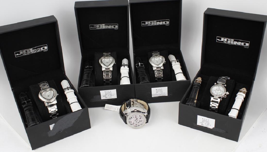 JOJINO WATCHES ASSORTED LOT OF 5: JOJINO WATCHES ASSORTED LOT OF 5 To include 1 pink leopard print face with black leather band, 3 stainless steel heart shaped face with spare black and white leather bands in box, and 1 stainless stee