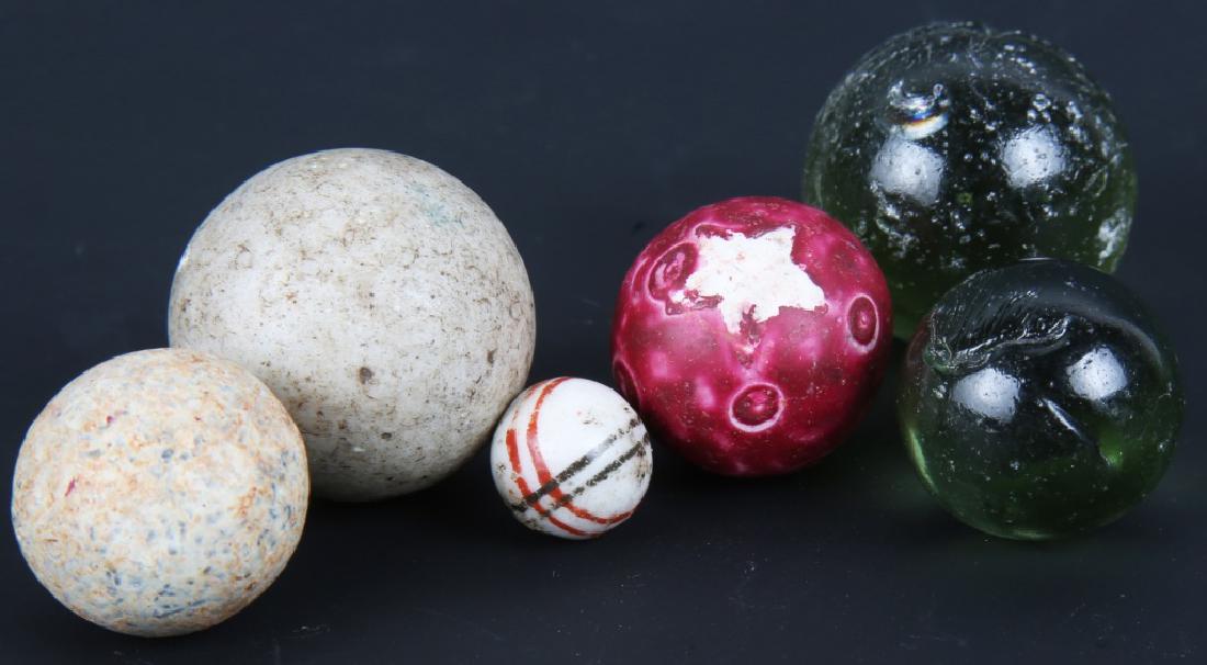 AMERICAN ANTIQUE CLAY & GLASS MARBLES - LOT OF 6: AMERICAN ANTIQUE CLAY & GLASS MARBLES - LOT OF 6 American antique clay and glass marbles - lot of 6.