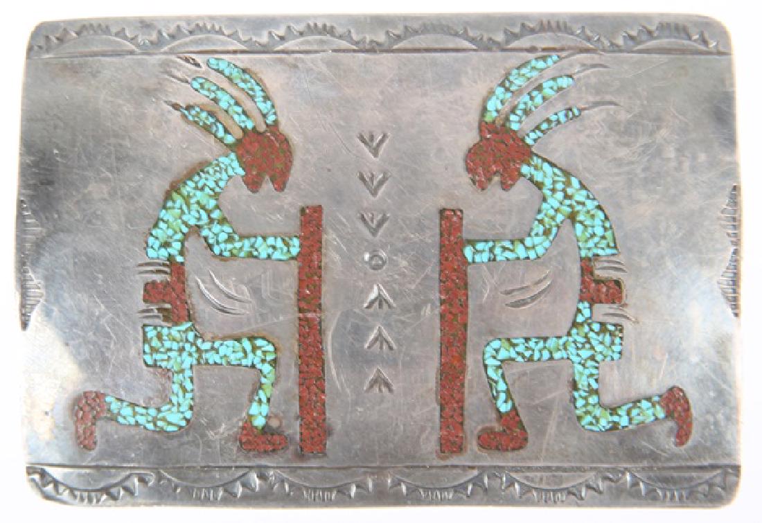 STERLING SILVER TURQUOISE & RED CORAL BELT BUCKLE: STERLING SILVER TURQUOISE & RED CORAL BELT BUCKLE Sterling silver blue turquoise and red coral chip accent belt buckle, dancing kokopelli motif. Weight: 31.5 grams Size: 2 x 3"