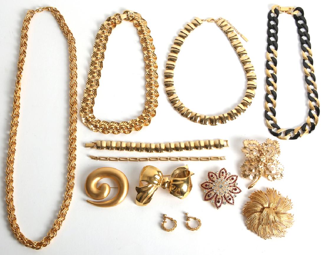 MONET & NAPIER GOLD TONE JEWELRY - LOT OF 12: MONET & NAPIER GOLD TONE JEWELRY - LOT OF 12 Including three Napier necklaces, one Napier pair of earrings, two Napier bracelets, one Monet necklace, and five Monet brooches.