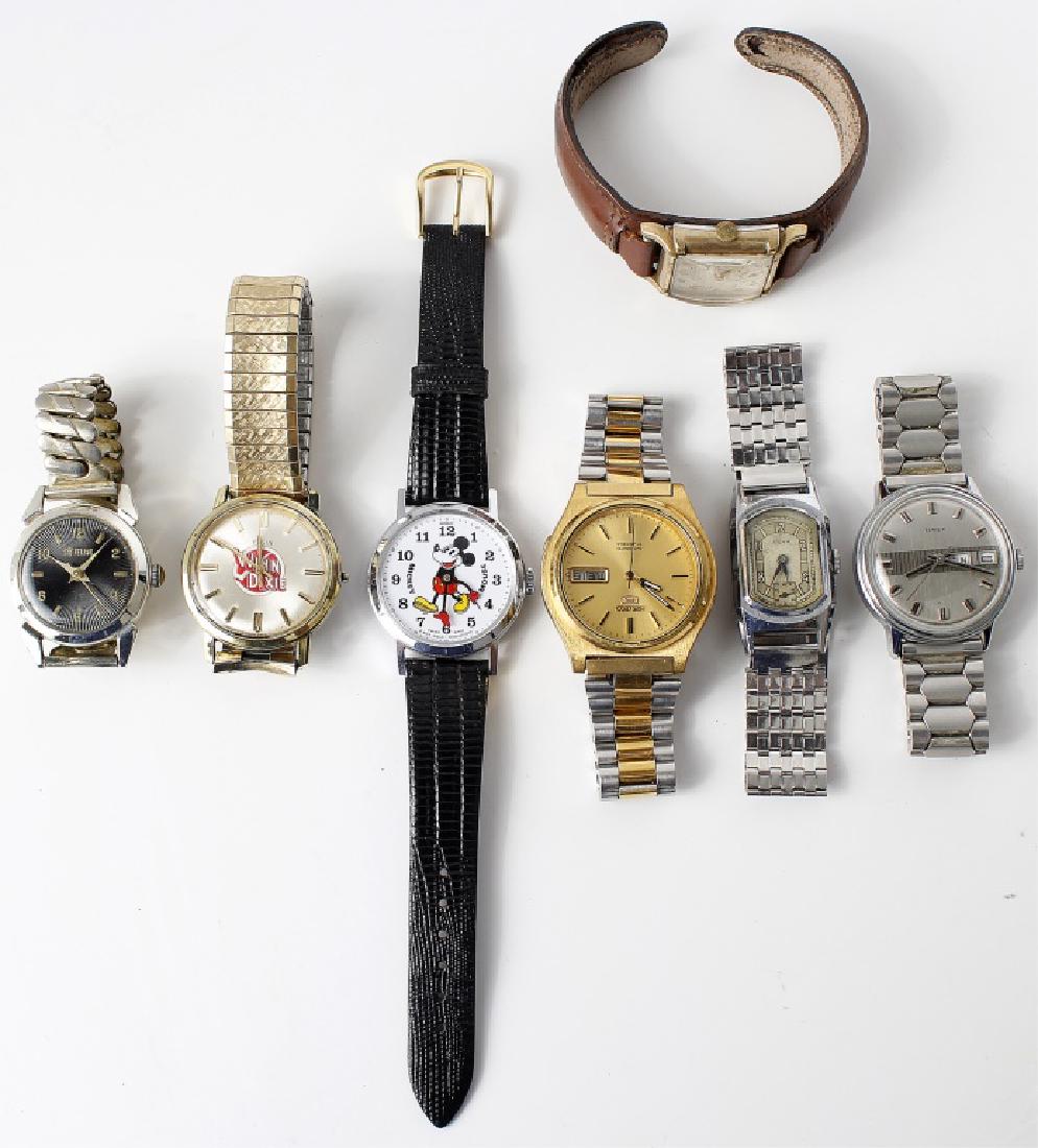 MEN`S VINTAGE WRISTWATCHES - LOT OF 7: MEN`S VINTAGE WRISTWATCHES - LOT OF 7 Men's wristwatch lot, to include: Seiko 5 Automatic, Steel Ulys art deco, Lord Nelson quartz, Elgin with Winn Dixie dial, Timex day date, Bradley Mickey Mouse wat