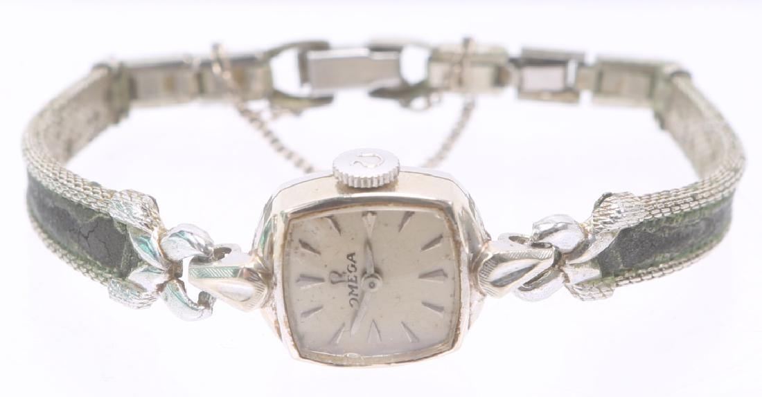 LADIES OMEGA 14K WHITE GOLD WRISTWATCH: LADIES OMEGA 14K WHITE GOLD WRISTWATCH Ladies Omega manual wind wristwatch in 14k white gold case. CAS monogram. Weight: 12.7 grams Size: 13mm