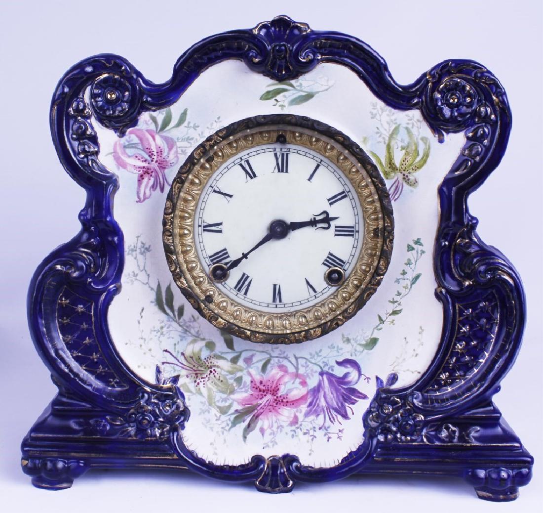 ANSONIA PORCELAIN MANTLE CLOCK "CRYSTAL PALACE": ANSONIA PORCELAIN MANTLE CLOCK "CRYSTAL PALACE" Ansonia "Crystal Palace" mantle clock. Porcelain case - no damage to case noted. Rare cobalt blue, very little loss to gold leaf trim. Size: 11" x 12"