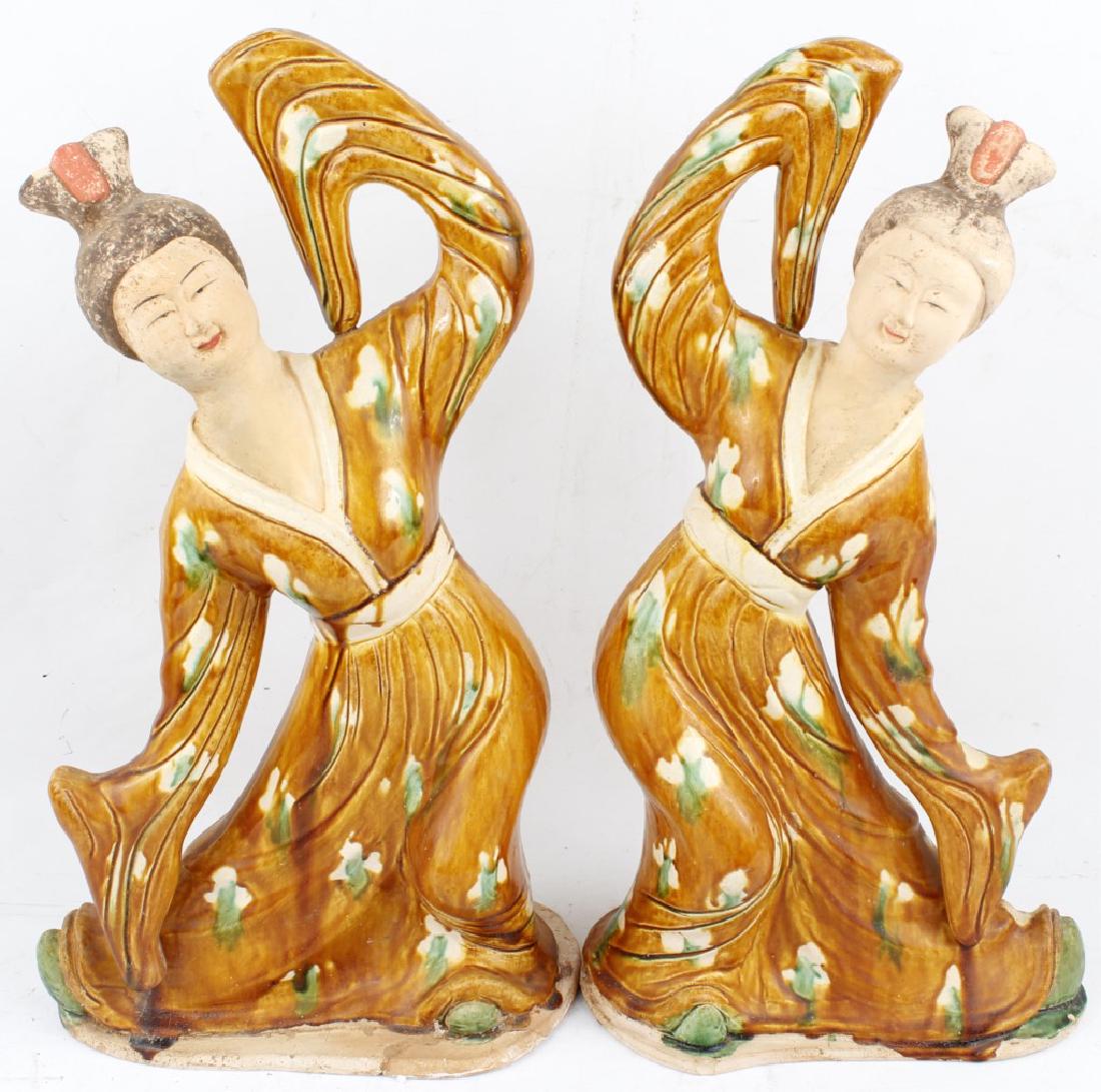 CHINESE SANCAI GLAZED DANCING FIGURINES LOT OF 2: CHINESE SANCAI GLAZED DANCING FIGURINES LOT OF 2 Pair of Chinese Sancai glazed dancing figurines. Traditional green and yellow glazed dresses with hand glazed facial features. Measures 19" H Size: 19"