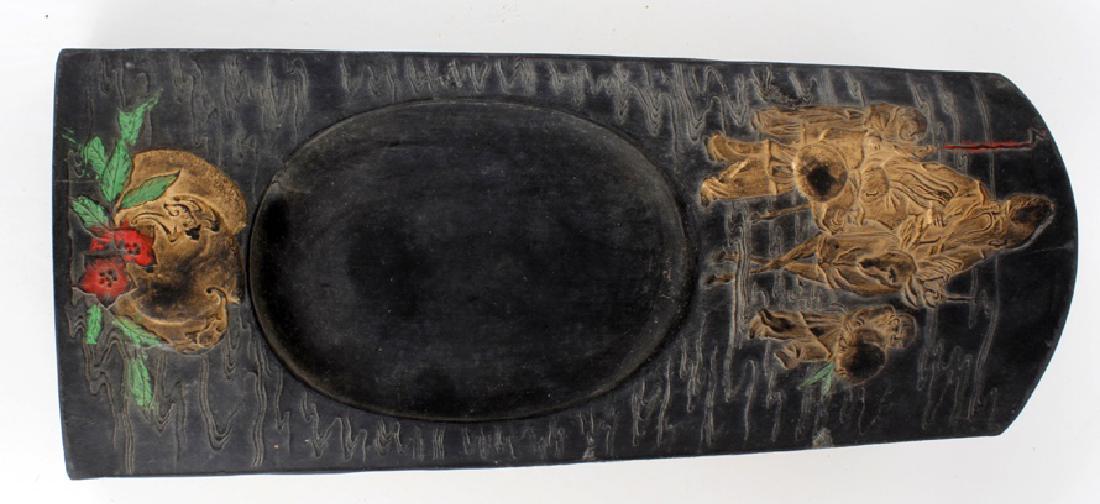 CHINESE INK CAKE CALLIGRAPHY BLOCK: CHINESE INK CAKE CALLIGRAPHY BLOCK Chinese black ink cake block. Gilt with an elderly gentleman riding a deer and floral decoration. in original silk presentation box. Size: 12" x 5"