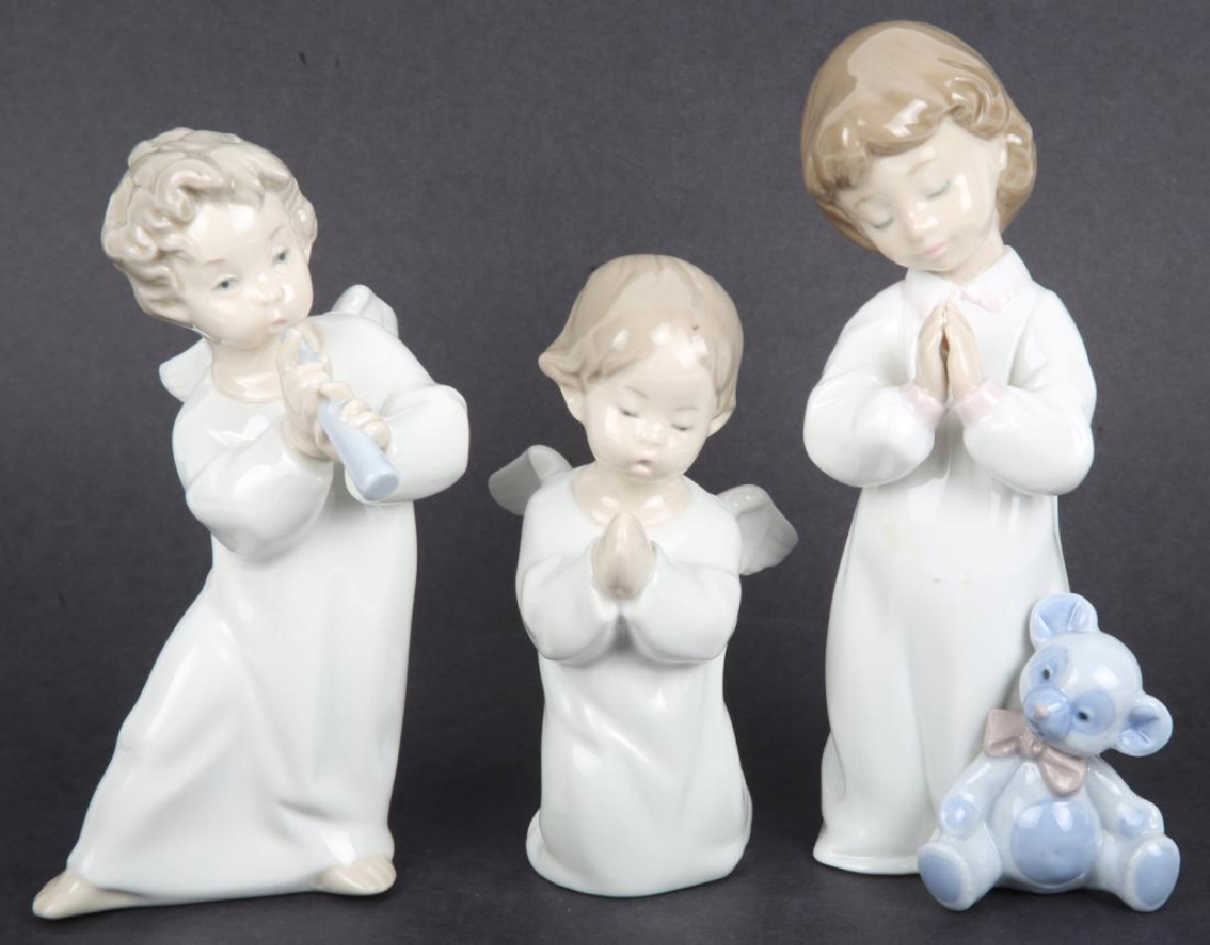 LLADRO PORCELAIN ANGEL FIGURINES - LOT OF 3: LLADRO PORCELAIN ANGEL FIGURINES - LOT OF 3 Lot of three Lladro porcelain figurines, one "Praying Angel" 4538, one "Angel with Flute", and one "Nighttime Blessing" 6581. Hand made in Spain. Size: 5.5