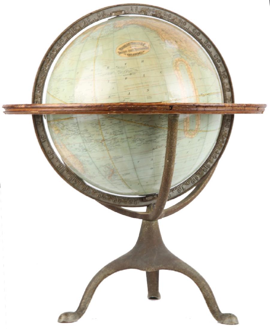 RAND MCNALLY 12" TERRESTRIAL GLOBE W/ IRON STAND: RAND MCNALLY 12" TERRESTRIAL GLOBE W/ IRON STAND Rand McNally 12" terrestrial globe with cast iron stand from the mid-20th Century. Size: 12" Globe