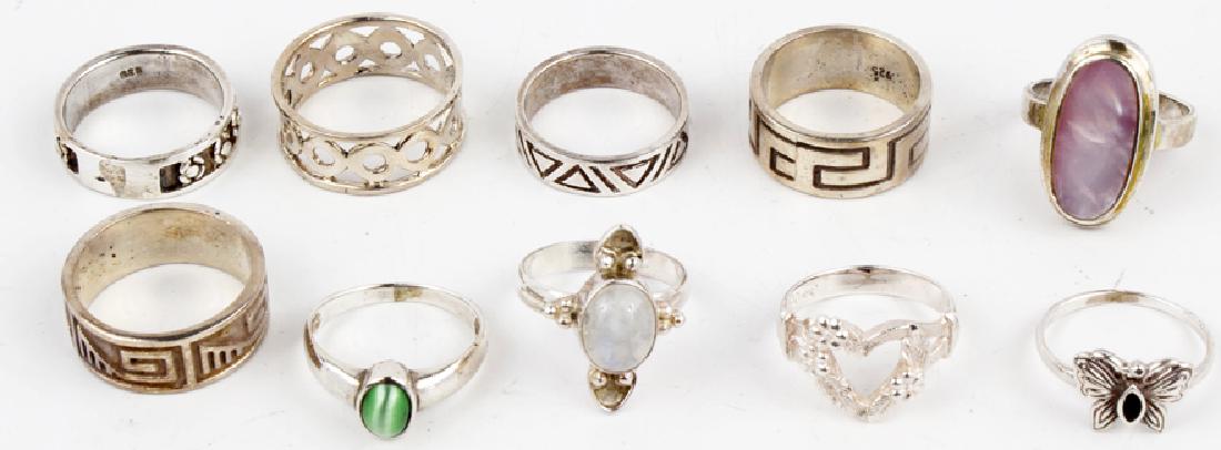 LOT OF 10 STERLING SILVER RINGS - ASSORTED: LOT OF 10 STERLING SILVER RINGS - ASSORTED Assorted dealers lot of 10 sterling silver .925 rings. Assorted sizes. Weight: 43 g