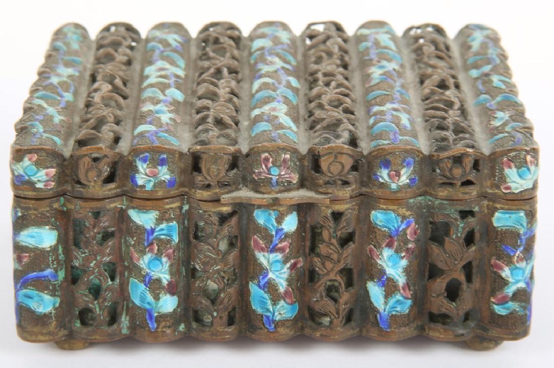COPPER & FLORAL ENAMEL INLAID JEWELRY BOX: COPPER & FLORAL ENAMEL INLAID JEWELRY BOX 20th century copper jewelry box with openwork and blue floral enamel accenting, stamped on underside. Size: 4.5 x 3.75 x 1.75"