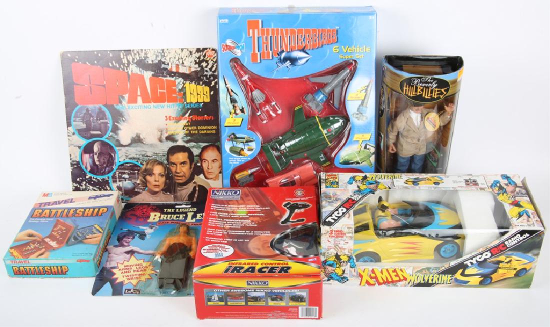 COLLECTIBLE TOYS - WOLVERINE BRUCE LEE BATTLESHIP: COLLECTIBLE TOYS - WOLVERINE BRUCE LEE BATTLESHIP Lot of varied collectible toys, to include: 1986 Bruce Lee action figure, 1986 Battleship, 1975 Space 1999 Record, 1993 Wolverine RC car, 1997 Beverly