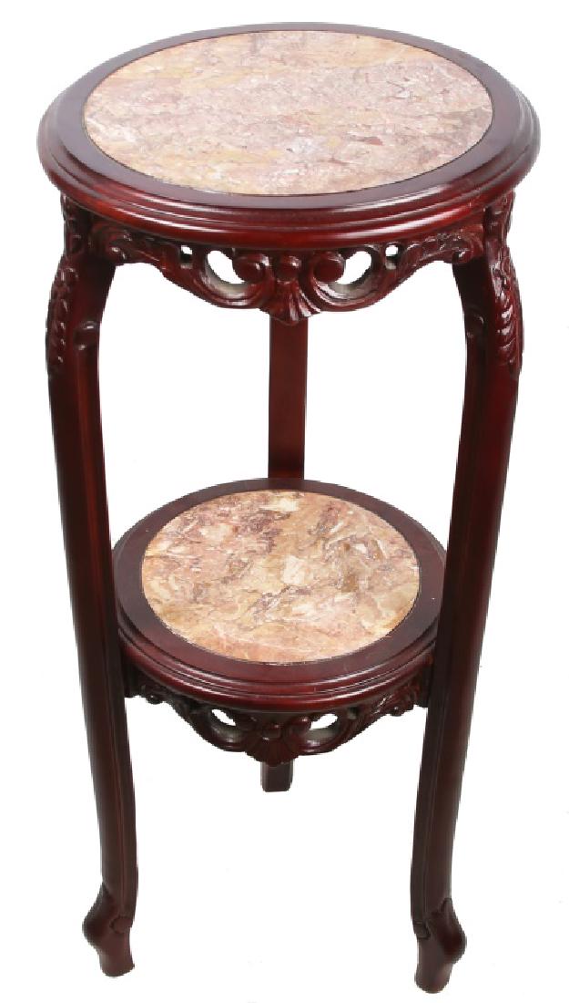 CHINESE CARVED ROSEWOOD & MARBLE TWO TIER STAND: CHINESE CARVED ROSEWOOD & MARBLE TWO TIER STAND Chinese dark wood carved floral motif two tier stand with orange / white marble centers. Size: 36" tall, 16" round