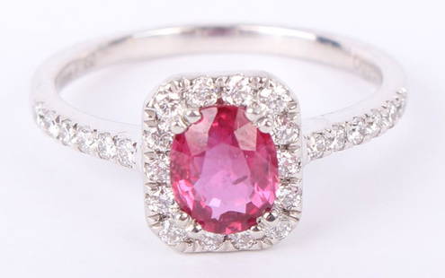 LADIES .950 PLATINUM RUBY & DIAMOND RING 1.07CT: LADIES .950 PLATINUM RUBY & DIAMOND RING 1.07CT Ladies .950 platinum custom made diamond and red ruby ring. Ring features a center Oval brilliant cut natural Corundum ruby of 1.07ct, purplish red