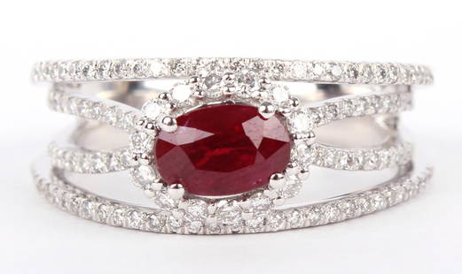 LADIES .950 PLATINUM RUBY & DIAMOND RING 1.04CT: LADIES .950 PLATINUM RUBY & DIAMOND RING 1.04CT Ladies .950 platinum custom made diamond and red ruby ring. Ring features a center Oval brilliant cut natural Corundum ruby of 1.04ct, no indication of