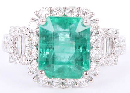 LADIES .950 PLATINUM EMERALD & DIAMOND RING 3.50CT: LADIES .950 PLATINUM EMERALD & DIAMOND RING 3.50CT Ladies .950 platinum custom made diamond and green emerald ring. Ring features a rectangular cut Natural Beryl emerald of 3.50ct, accented by 1.06ct