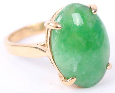 LADIES 14K YELLOW GOLD OVAL GREEN JADE RING: LADIES 14K YELLOW GOLD OVAL GREEN JADE RING Ladies 14k yellow gold and green jadeite ring with oval cut center stone in basket setting. 18x12mm center stone. Weight: 4.9 grams Size: 6