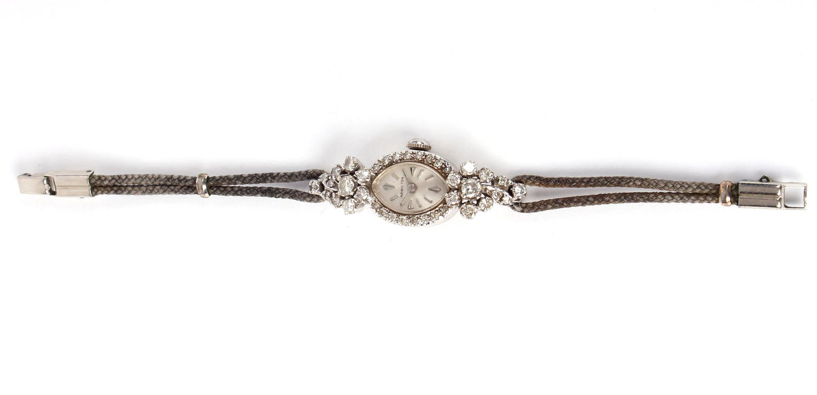 LADIES HAMILTON 14K WHITE GOLD DIAMOND WRIST WATCH: LADIES HAMILTON 14K WHITE GOLD DIAMOND WRIST WATCH Antique ladies 14k white gold diamond art deco wristwatch by Hamilton. Silver dial with steel indices and hands. Case body features a cascade of diam