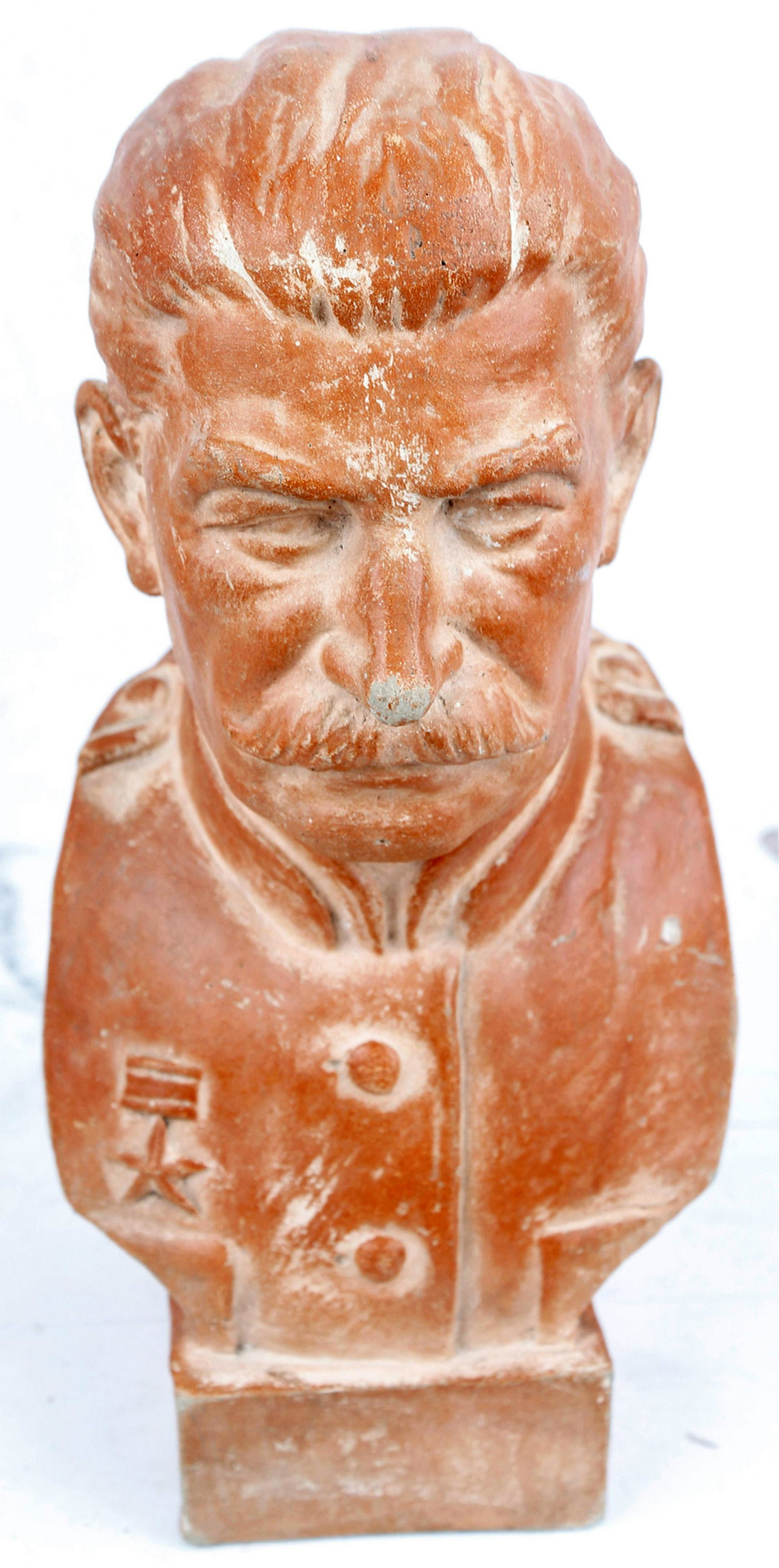 TERRACOTTA JOSEPH STALIN SCULPTURE BUST ZITEK: TERRACOTTA JOSEPH STALIN SCULPTURE BUST ZITEK A scarce terracotta early Soviet era bust of Joseph Stalin, c. 1940’s, depicted in military uniform with a single star medal, signed “Zitek” on the 